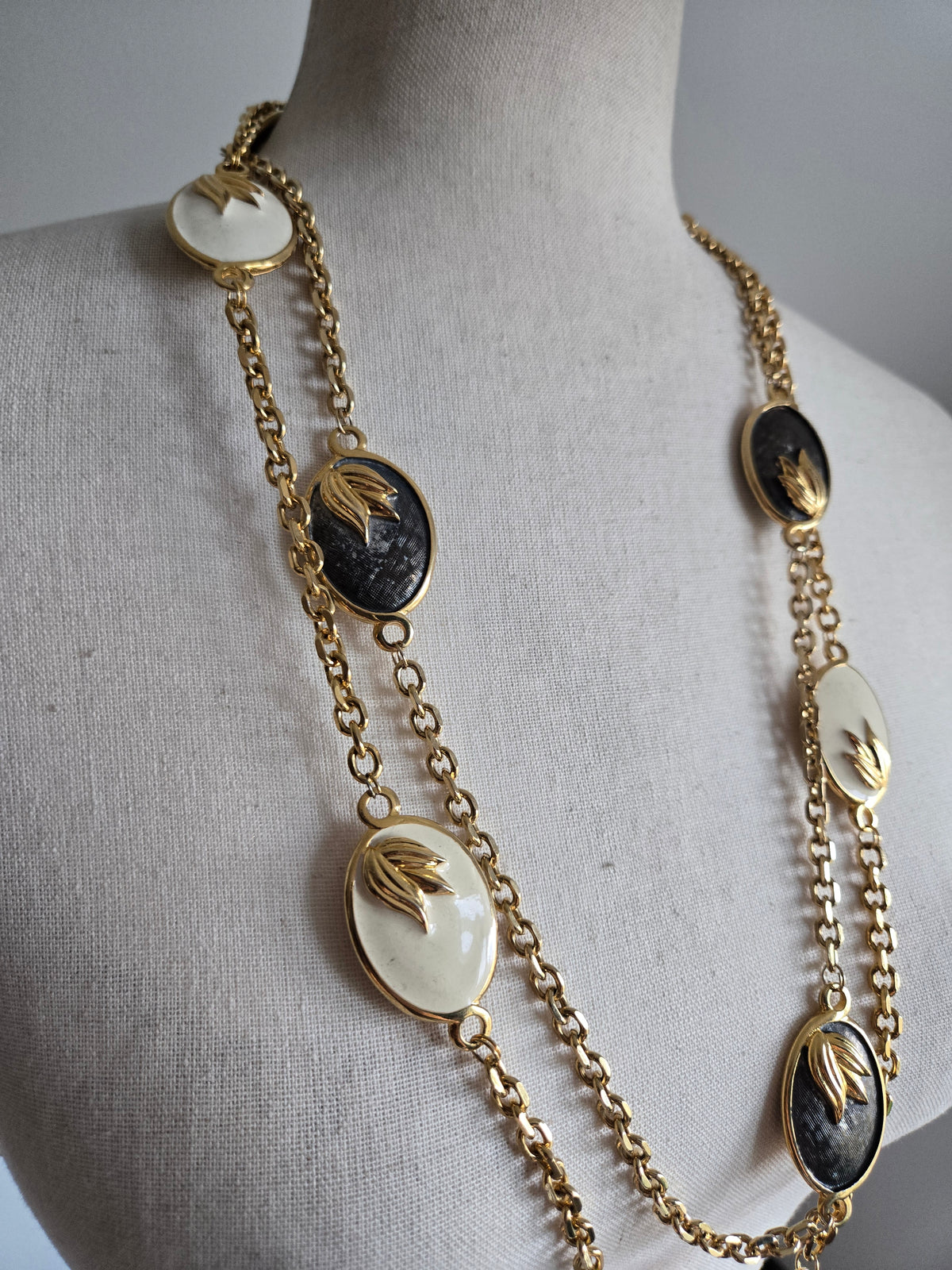 Vintage Black and White Statement Necklace with Gold Leaf Design