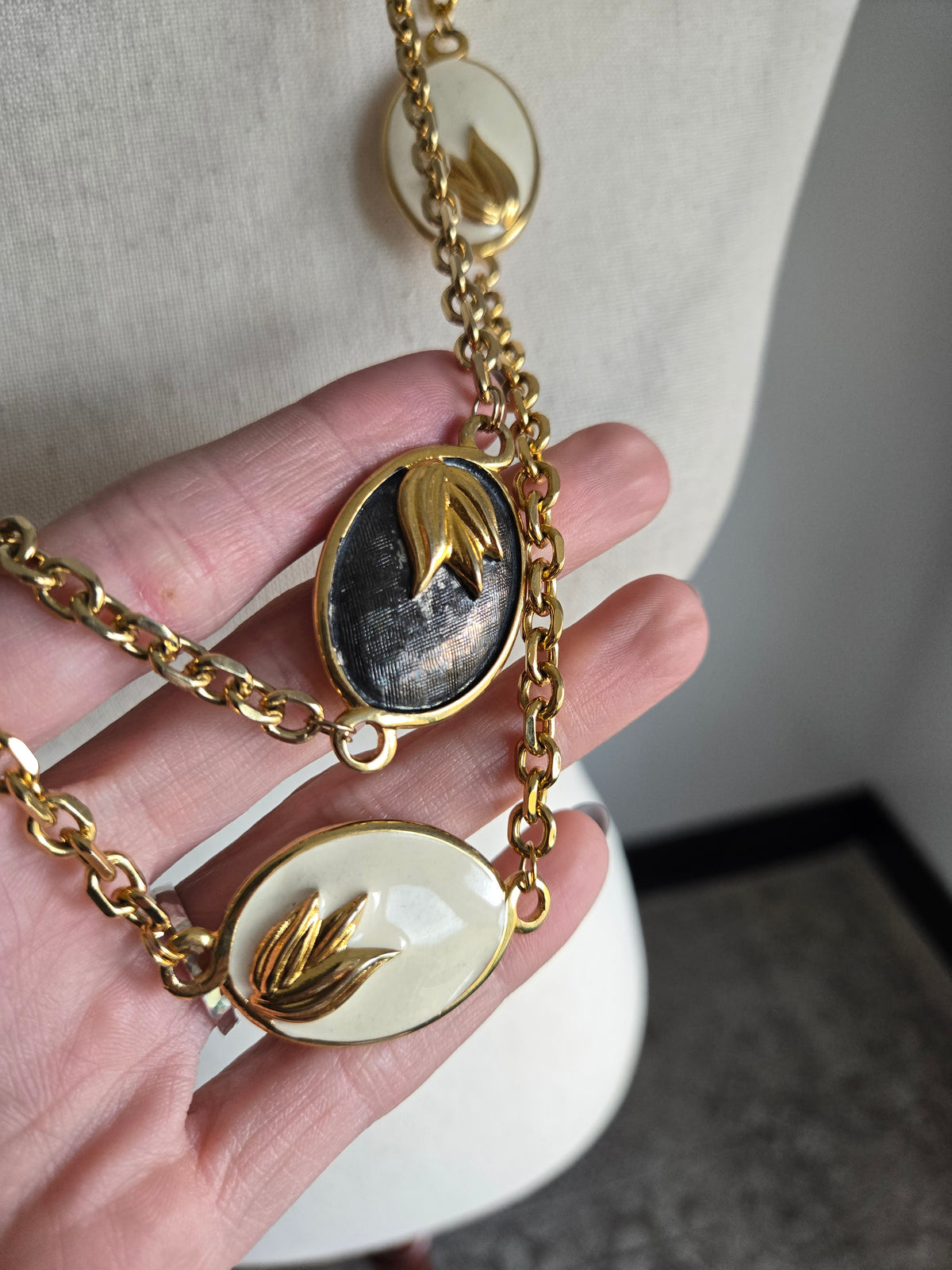 Vintage Black and White Statement Necklace with Gold Leaf Design