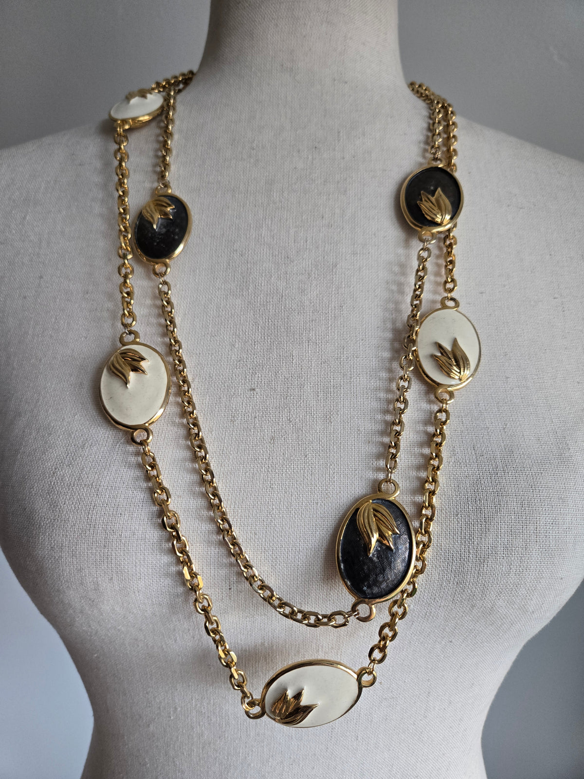 Vintage Black and White Statement Necklace with Gold Leaf Design